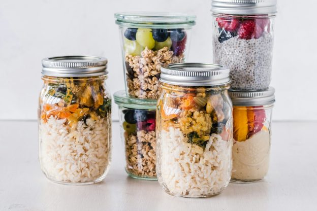 Glass jars filled with prepared meals