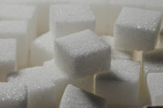 A pile of white sugar cubes