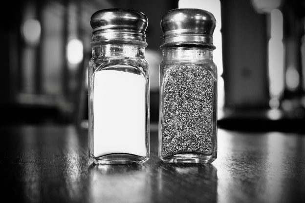 Salt and pepper shakers on a table